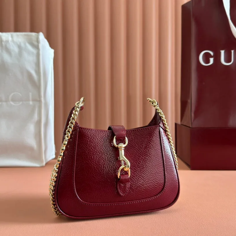 Jackie Notte Mini Bag 19 in Red Wine Cracked Lacquer Calfskin Gold Hardware