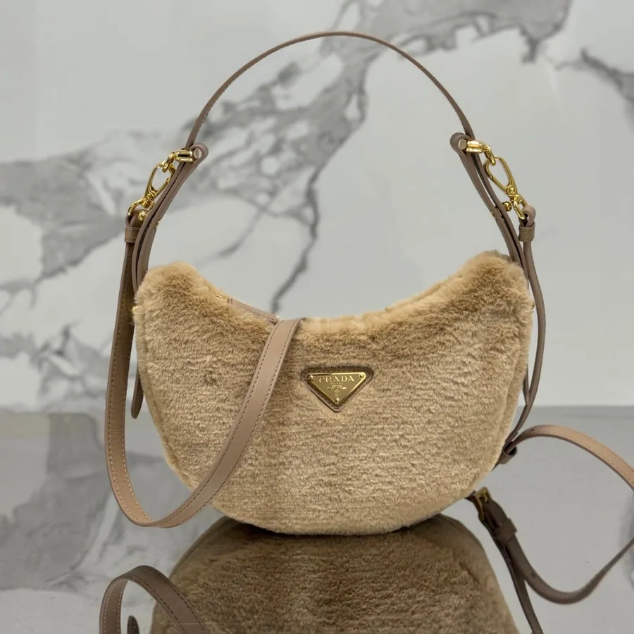 Prada Leather And Shearling Arqu㨠Handbag