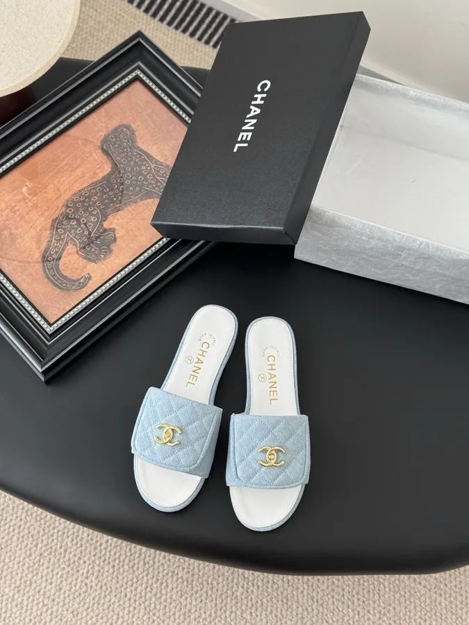 Chanel Women Light Blue Quilted Fabric Slides