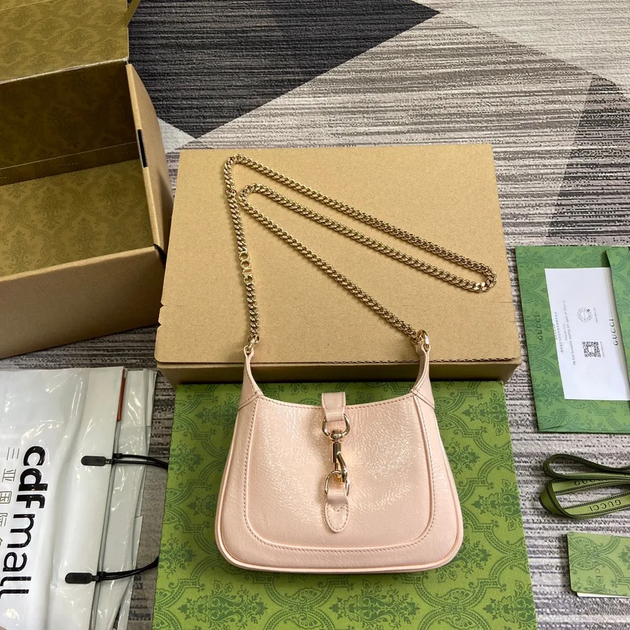 Jackie Notte Mini Bag 19 in Light Pink Cracked Lacquer Calfskin Gold Hardware