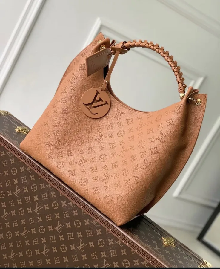 Louis Vuitton Carmel Mahina Leather Hobo Bag in Cognac