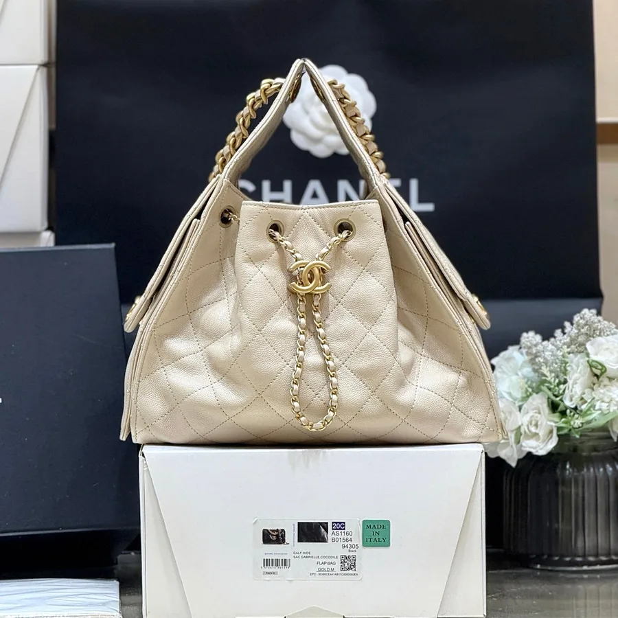 Chanel 25 Handbag in Cream Small Gold Hardware