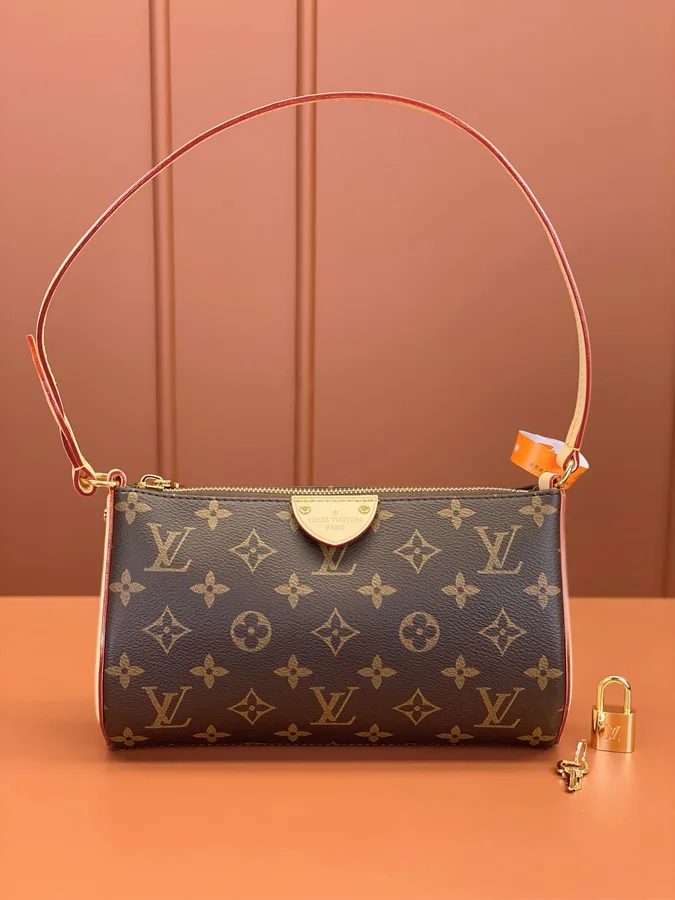 Louis Vuitton Pochette Tirette bag in monogram coated canvas
