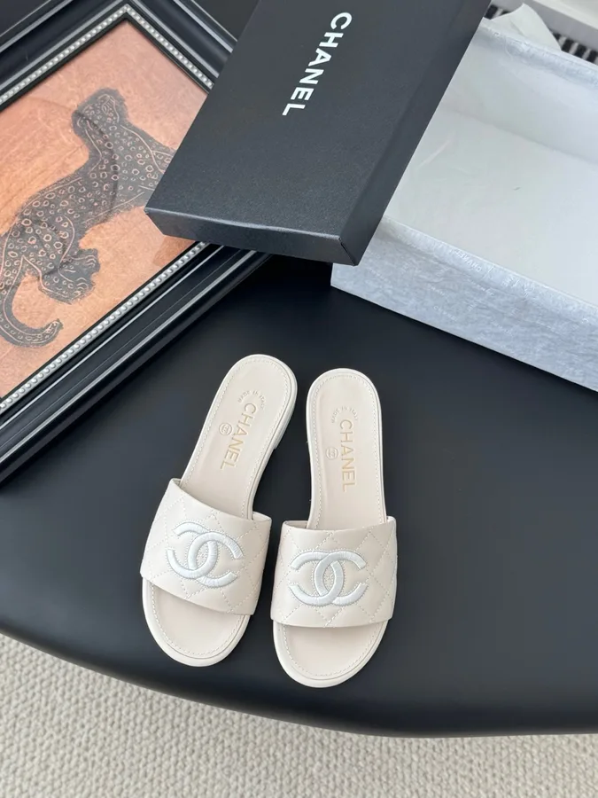 Chanel Women Cream Quilted Leather Slides