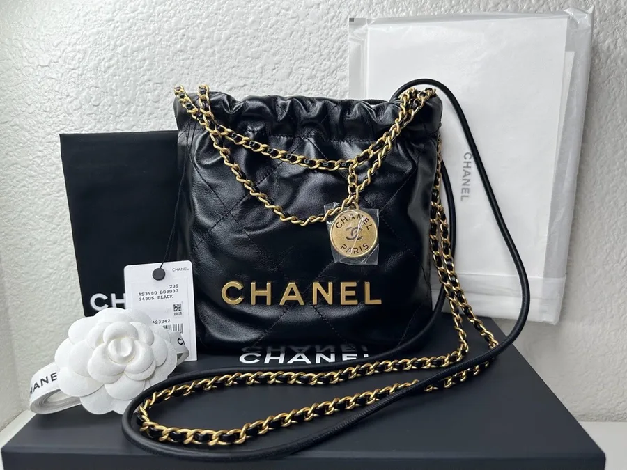 Chanel 22 Mini Hobo Handbag in Black Shiny Calfskin with Pearls