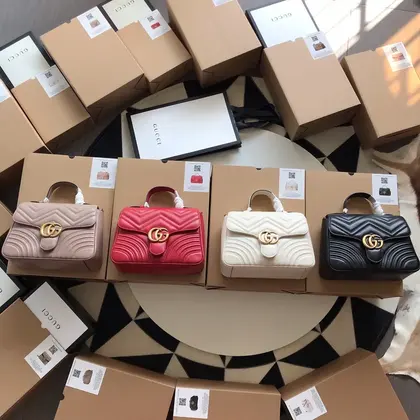 GG Marmont Small Top Handle Bag — Gucci Handbags sample