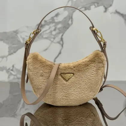 Prada Leather And Shearling Arqu㨠Handbag — Prada Handbags sample