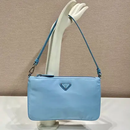 Shoulder Bag 24 with Triangle Logo in SKY Blue Re-nylon Fabric — Prada Handbags sample