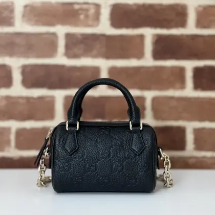 GUCCI GG Emblem medium boston bag in Black Leather — Gucci Handbags sample