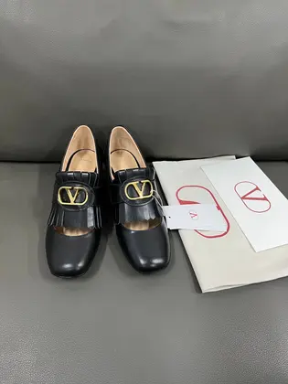 Valentino Women Black Leather Fringe Loafers — Valentino Handbags sample