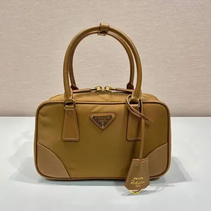 Small Top Handle Bag 25 in Golden Brown Nylon and Calfskin Trim — Prada Handbags sample