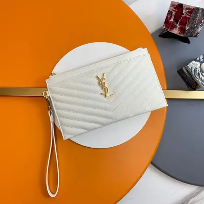 YSL Cassandre Mattelasè Large Zipped Pouch in Grain de Poudre Embossed Leather — Saint Laurent Handbags sample