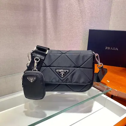 Small Flap Bag 21 in Black Triangular Quilted Pattern Re-nylon — Prada Handbags sample