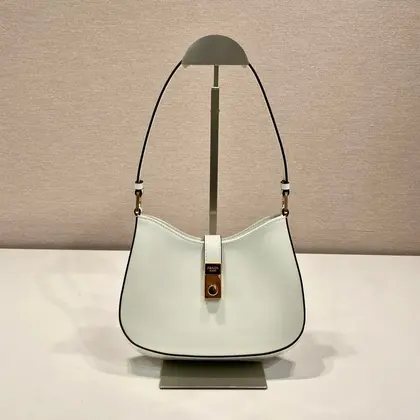 Prada Cleo Shoulder Bag 22 in White Brushed Lambskin with Clasp Closure — Prada Handbags sample