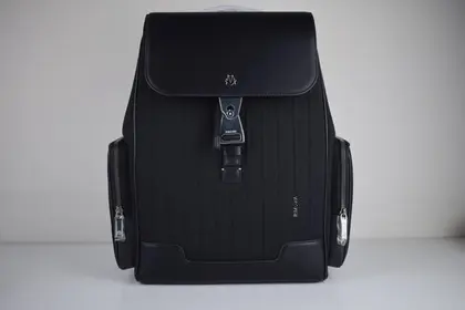 RIMOWA Never Still Flap Backpack in black — Handbags — Other Handbags sample