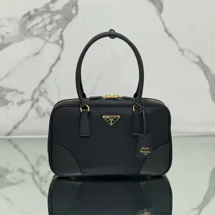 Medium Top Handle Bag 30 in Black Nylon and Calfskin Trim — Prada Handbags sample