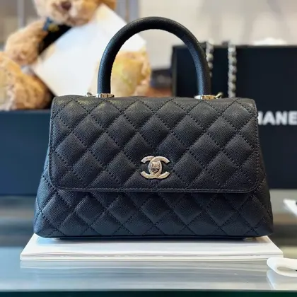 Chanel Coco Handbag Leather Black With Silver Lock 23cm — Chanel Handbags sample