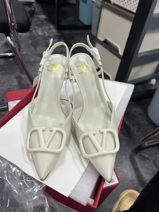 Valentino Women White Slingback Leather Pumps — Valentino Handbags sample