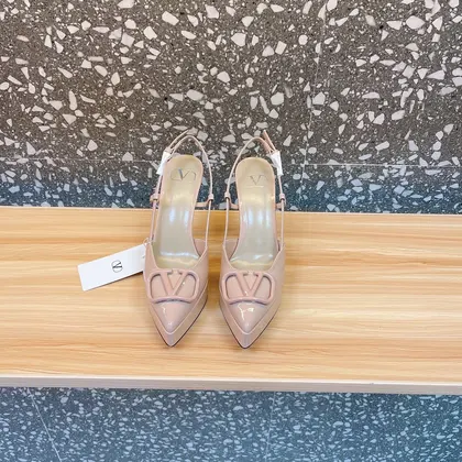 Valentino Women Nude Patent Leather Slingback Pumps — Valentino Handbags sample
