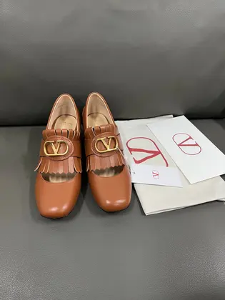Valentino Women Brown Leather Fringe Loafers — Valentino Handbags sample